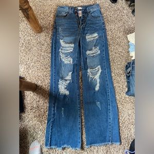 High waisted blue jeans with flare
